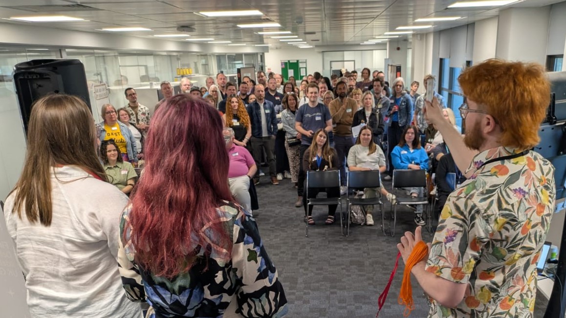 Crowd of people attending DeliverCon2025